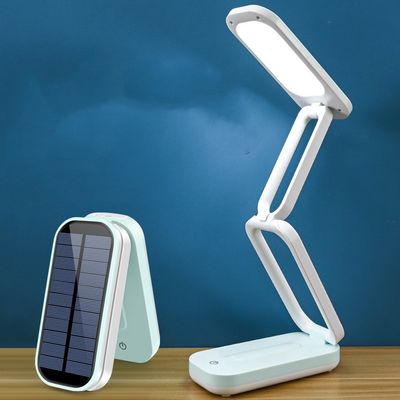 Lampe de bureau pliable démontable rechargeable solaire en plastique de protection oculaire de la batterie au lithium de moulage par injection de STP LED